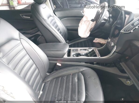 2FMPK4J93RBA49780 2024 FORD EDGE Silver Widok wnętrza z przodu