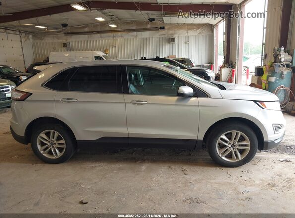 2FMPK4J94JBC59163 2018 FORD EDGE Silver Widok wnętrza z tyłu