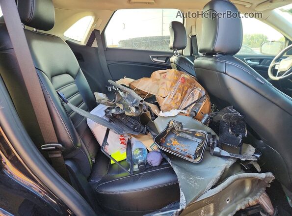 2FMPK4J94RBA29912 2024 FORD EDGE Black Vista de los asientos traseros