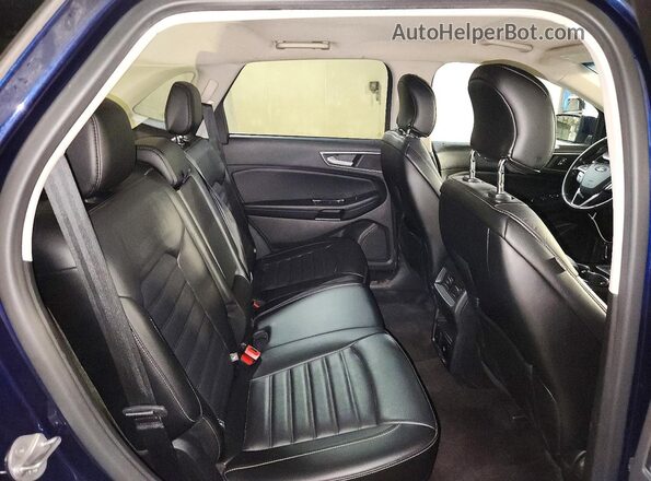 2FMPK4J95GBB89486 2016 FORD EDGE Blue Vista interior trasera