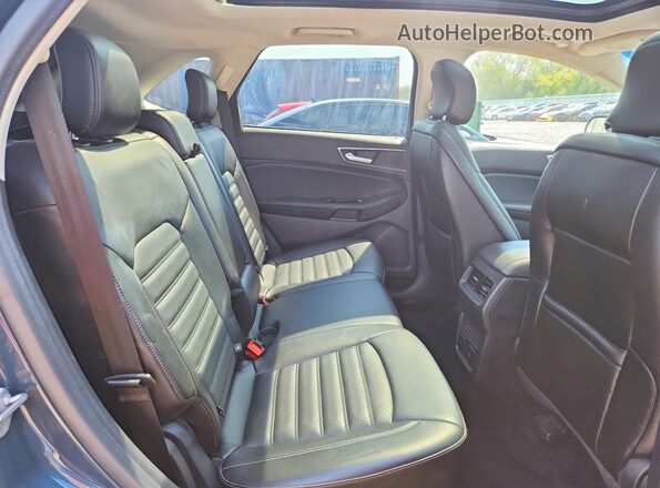 2FMPK4J95GBC40713 2016 FORD EDGE Teal Widok wnętrza z tyłu