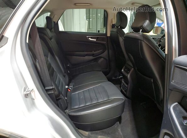 2FMPK4J95GBC55471 2016 FORD EDGE Silver Vista interior trasera