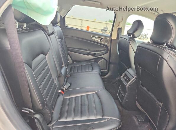 2FMPK4J95KBC75342 2019 FORD EDGE Silver Սալոնի հետևի տեսք