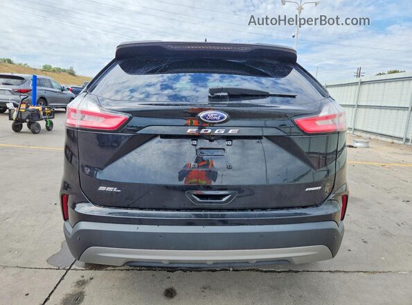2FMPK4J95NBB04207 2022 FORD EDGE Черный Вид сзади