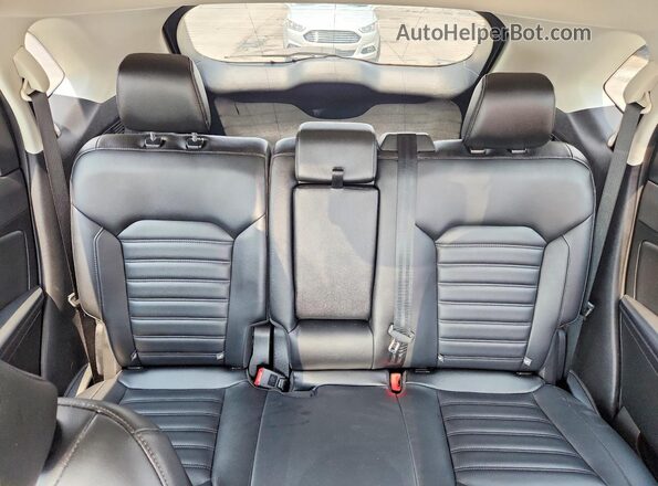 2FMPK4J95RBA46864 2024 FORD EDGE White Rear seats view