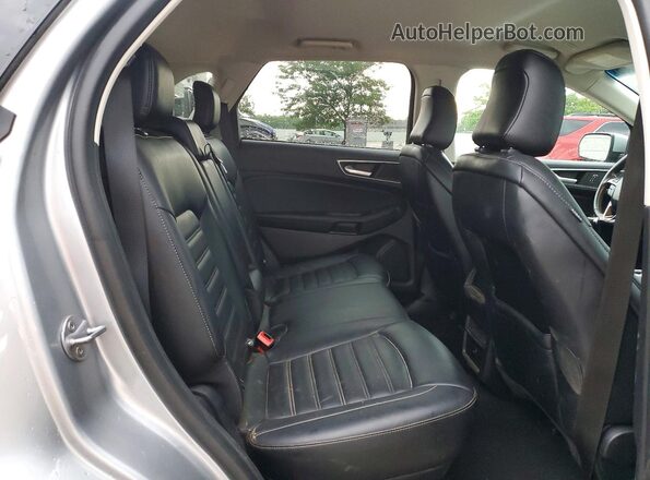 2FMPK4J95RBA68394 2024 FORD EDGE Silver Vista interior trasera