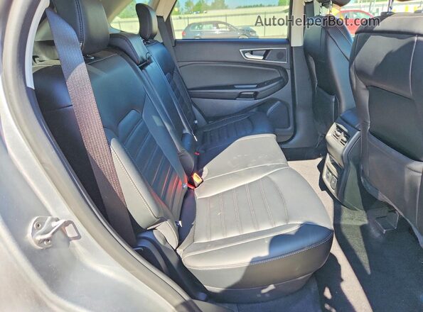 2FMPK4J95RBB20980 2024 FORD EDGE Silver Vista interior trasera
