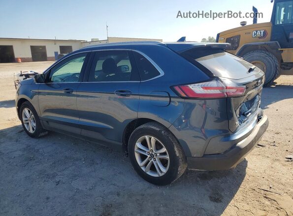 2FMPK4J96KBB42332 2019 FORD EDGE Blue Trasero izquierdo