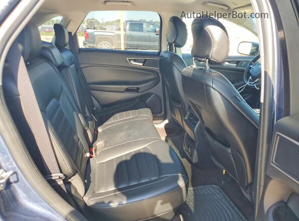 2FMPK4J96KBB42332 2019 FORD EDGE Blue Vista interior trasera