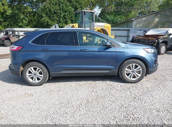 2FMPK4J96KBC39272 2019 FORD EDGE Blue Սալոնի հետևի տեսք