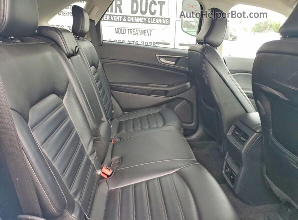 2FMPK4J96MBA63696 2021 FORD EDGE White Вид задньої частини салону
