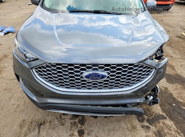 2FMPK4J96RBA61938 2024 FORD EDGE Gray Vista interior trasera