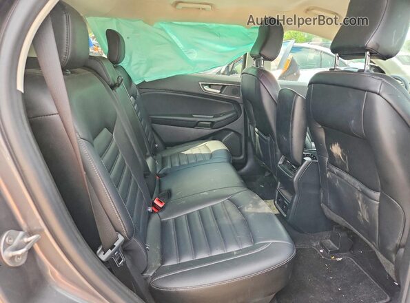 2FMPK4J96RBA61938 2024 FORD EDGE Gray Vista de los asientos traseros