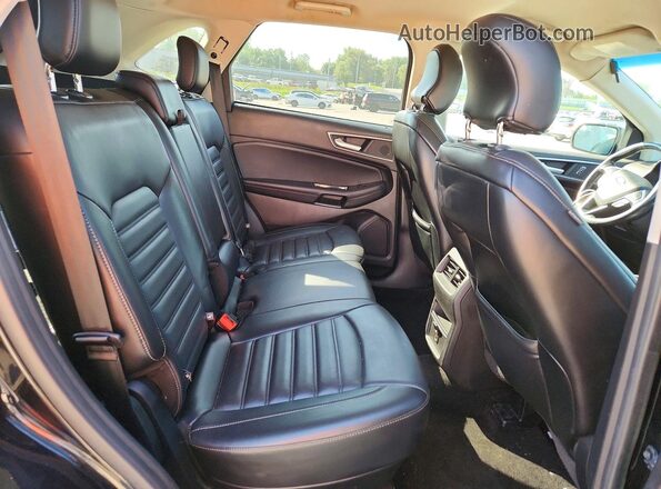 2FMPK4J97HBC42495 2017 FORD EDGE Black Vista interior trasera