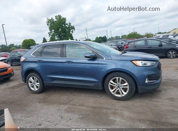 2FMPK4J97KBB03586 2019 FORD EDGE Blue Սալոնի հետևի տեսք