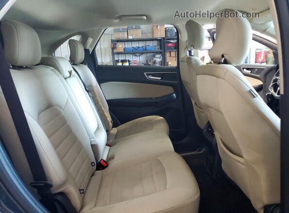 2FMPK4J97KBB70768 2019 FORD EDGE Teal Widok wnętrza z tyłu