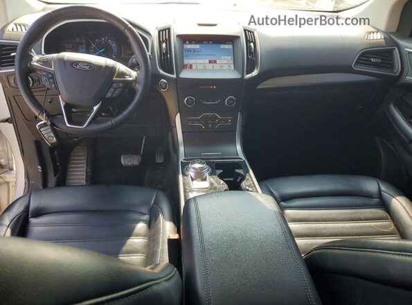 2FMPK4J97KBC74774 2019 FORD EDGE Серебряный Вид панели приборов