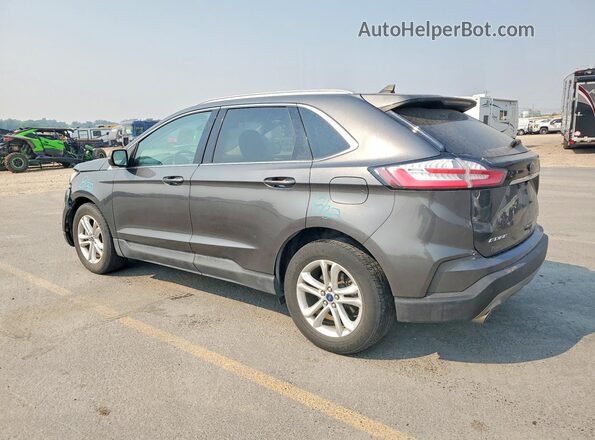 2FMPK4J97LBB48335 2020 FORD EDGE Charcoal Rear left