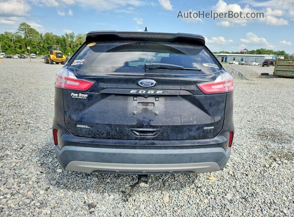 2FMPK4J97RBA26759 2024 FORD EDGE Black უკანა ხედი
