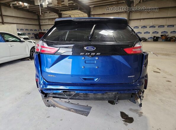 2FMPK4J97RBA96908 2024 FORD EDGE Blue უკანა ხედი