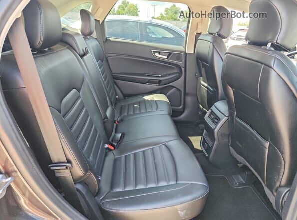 2FMPK4J98GBC30659 2016 FORD EDGE Charcoal Вид задньої частини салону