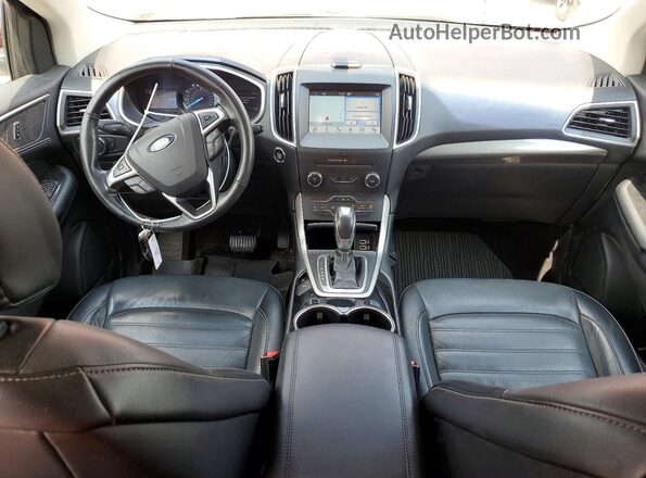 2FMPK4J98HBB03735 2017 FORD EDGE Красный Вид панели приборов