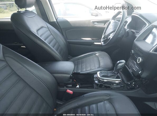 2FMPK4J98JBB71782 2018 FORD EDGE Черный Вид салона спереди