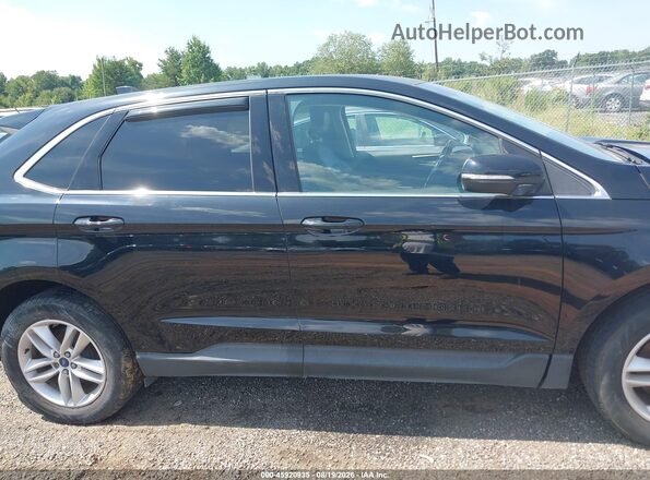 2FMPK4J98JBB71782 2018 FORD EDGE Черный Вид задней части салона