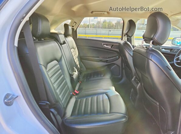 2FMPK4J98KBB90320 2019 FORD EDGE White Вид задньої частини салону