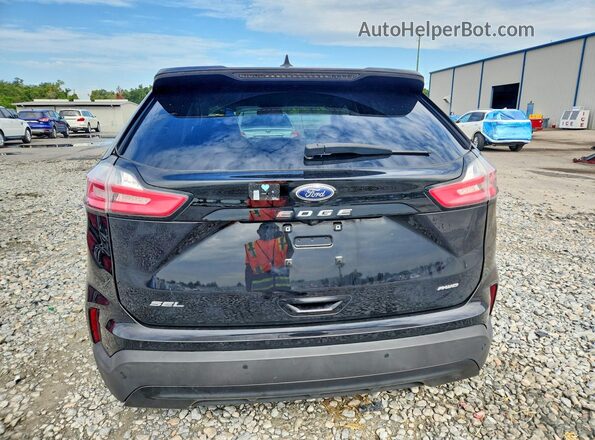 2FMPK4J98RBA63285 2024 FORD EDGE Black Հետևի տեսք