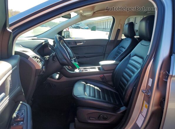 2FMPK4J99RBA67748 2024 FORD EDGE Silver Widok wnętrza z przodu