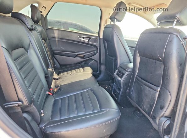 2FMPK4J99RBA76224 2024 FORD EDGE White Вид задньої частини салону