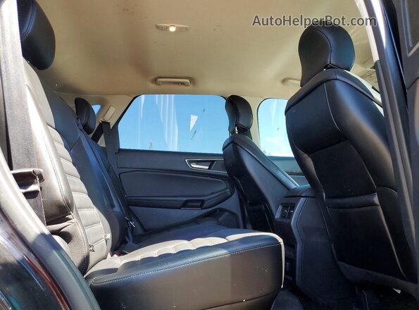 2FMPK4J9XHBC19082 2017 FORD EDGE Black Rear interior view