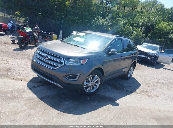 2FMPK4J9XJBB77292 2018 FORD EDGE Gray Vista tres cuartos delantera izquierda