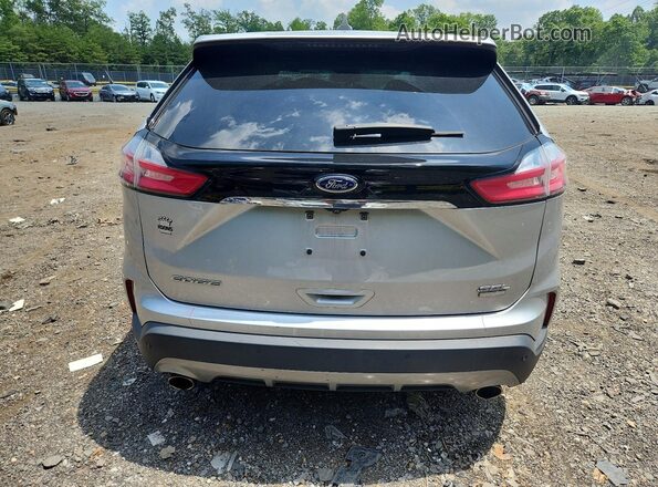 2FMPK4J9XKBC28436 2019 FORD EDGE Silver Rear view