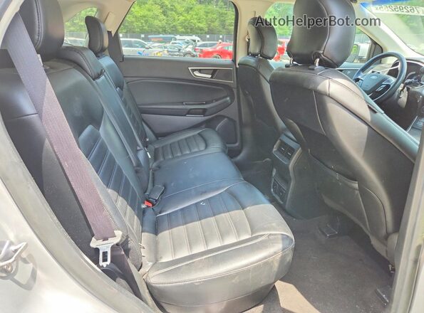 2FMPK4J9XKBC28436 2019 FORD EDGE Silver Rear interior view