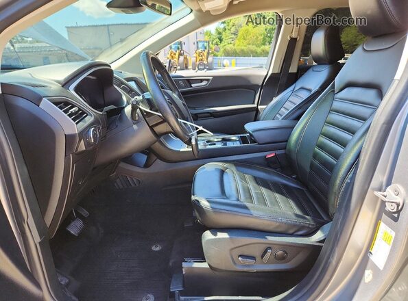 2FMPK4J9XLBB48085 2020 FORD EDGE Серебряный Вид салона спереди