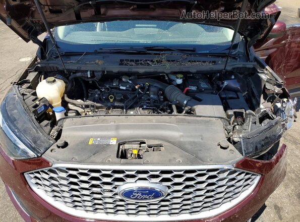 2FMPK4J9XPBA12237 2023 FORD EDGE Burgundy Widok wnętrza z tyłu