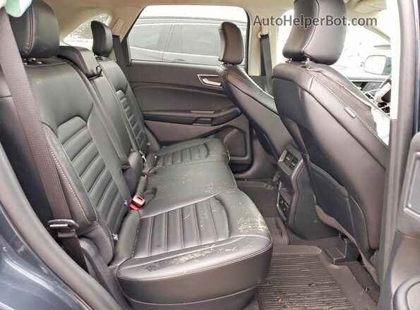 2FMPK4J9XRBB27794 2024 FORD EDGE Blue Vista interior trasera