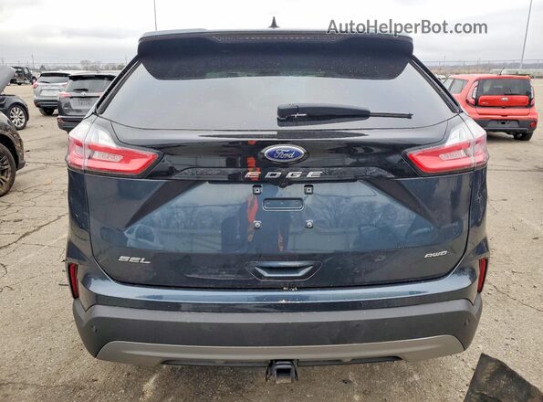 2FMPK4J9XRBB27794 2024 FORD EDGE Blue Vista trasera