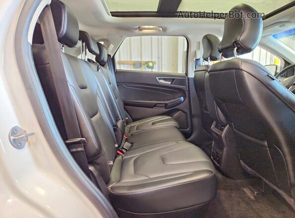 2FMPK4K86JBB72810 2018 FORD EDGE White Вид задньої частини салону