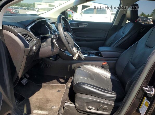 2FMPK4K91KBB97530 2019 FORD EDGE Черный Вид салона спереди