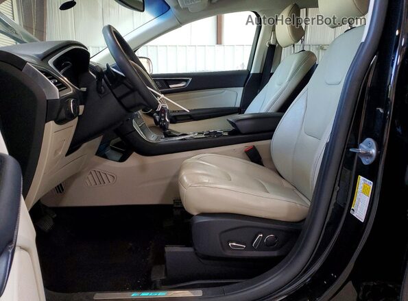 2FMPK4K92HBB06127 2017 FORD EDGE Black Front interior view