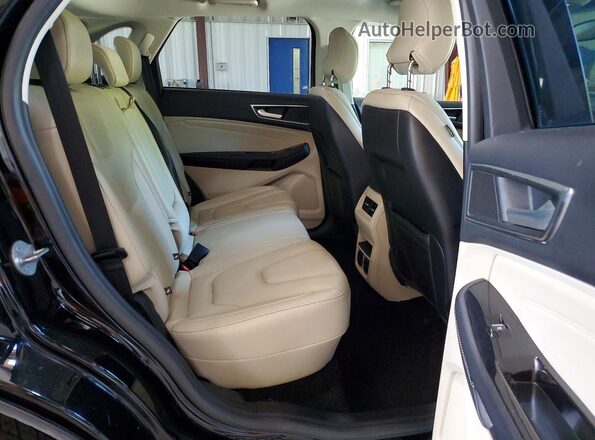 2FMPK4K92HBB06127 2017 FORD EDGE Black Rear interior view