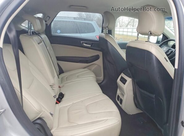 2FMPK4K92HBC05093 2017 FORD EDGE Silver Vista interior trasera
