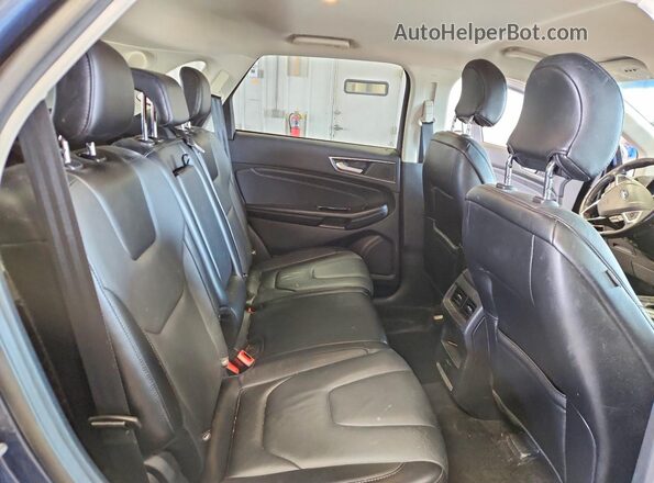 2FMPK4K92JBB15643 2018 FORD EDGE Blue Vista interior trasera