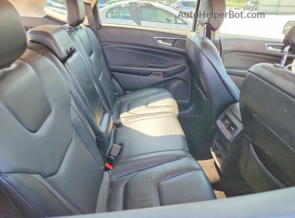 2FMPK4K92JBB67712 2018 FORD EDGE Black Rear interior view