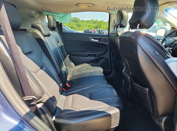 2FMPK4K92KBC05618 2019 FORD EDGE Синий Вид задней части салона