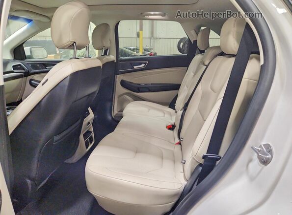 2FMPK4K92KBC14383 2019 FORD EDGE White Rear interior view
