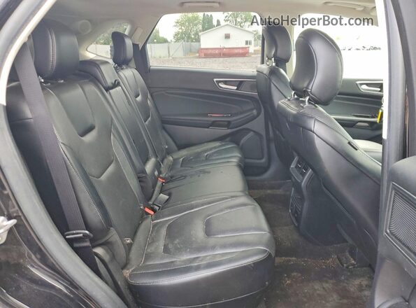 2FMPK4K92KBC17624 2019 FORD EDGE Black Vista interior trasera